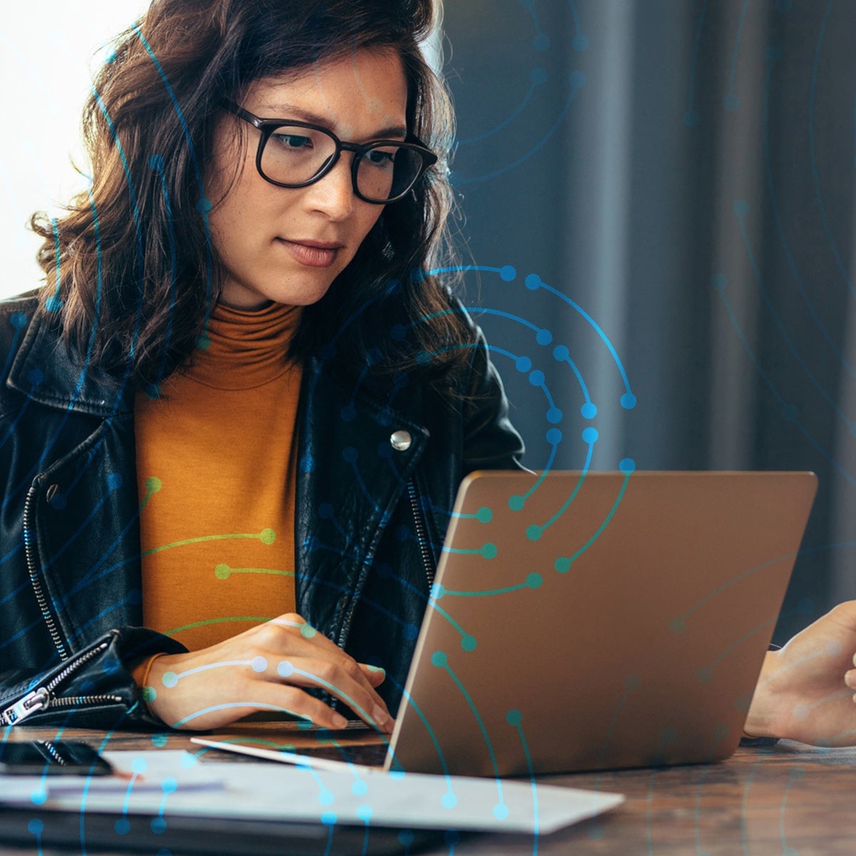 Woman in glasses with laptop