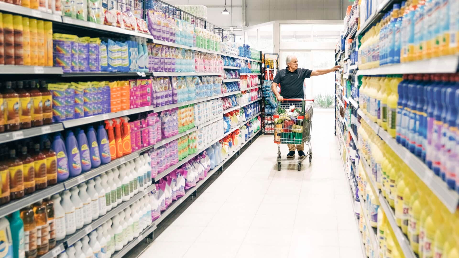 Person browsing cleaning products in store